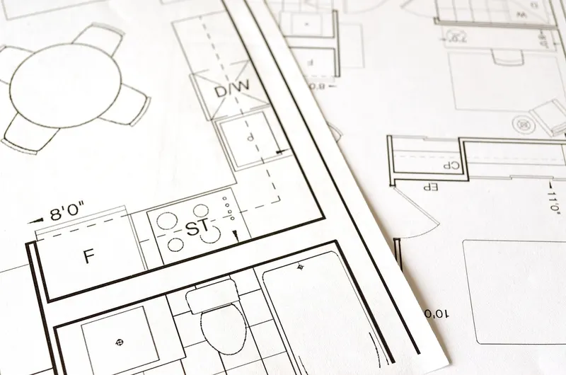 Architectural blueprints showing kitchen layout and dimensions